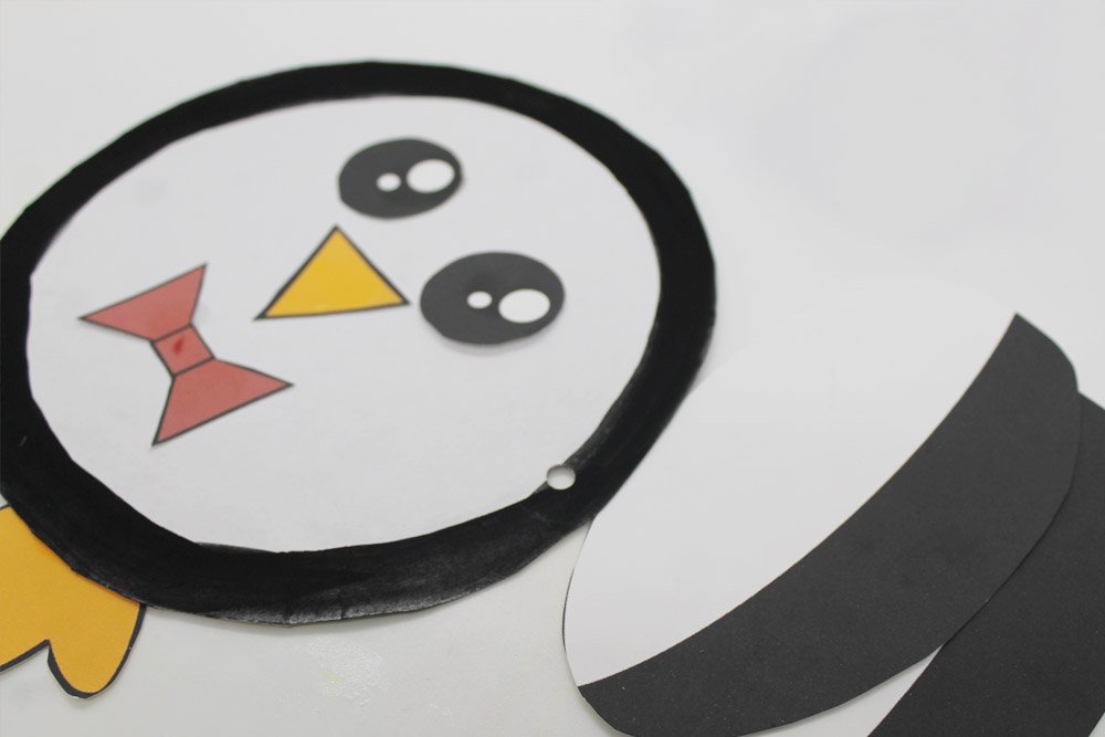 How to Make a Paper Plate Penguin - Step 19